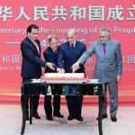 Prime Minister Shahbaz Sharif along with Chinese Ambassador Jiang Zaidong cutting a cake on China National Day at a local hotel