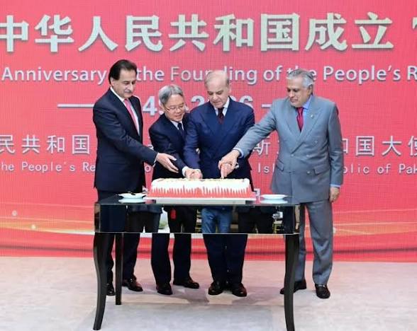 Prime Minister Shahbaz Sharif along with Chinese Ambassador Jiang Zaidong cutting a cake on China National Day at a local hotel
